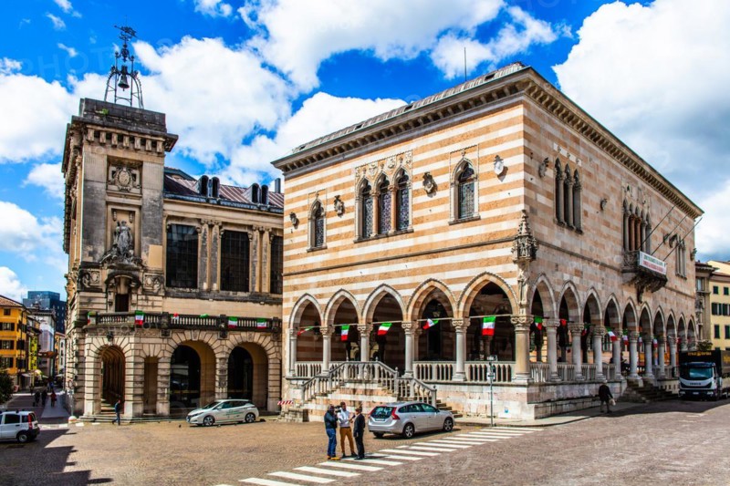 White and pink striped Loggia del Lionello in the finest Venetian Gothic style, 15th century with town hall, in Piazza della Liberta, Udine, most important historical town in Friuli, Italy, Udine, Friuli, Italy, Europe