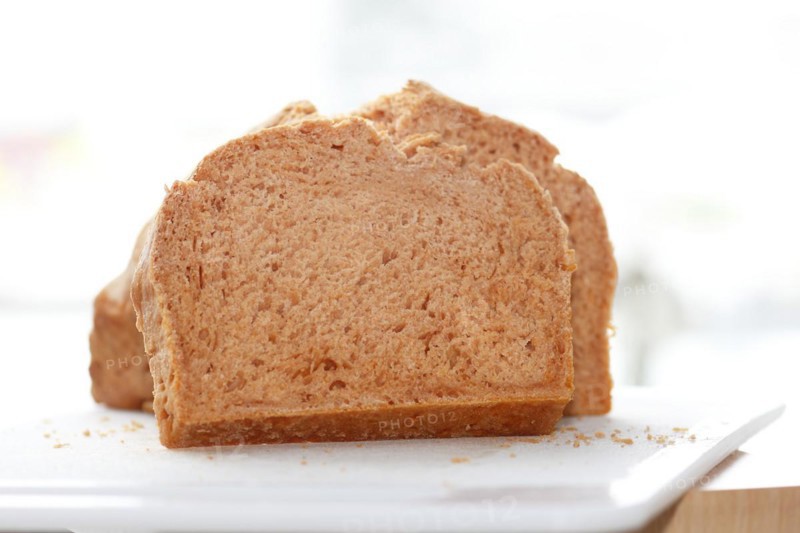 Wheat bread sliced on a board