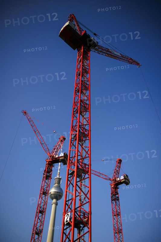 Symbolic photo on the topic 'Aeo Building in Berlin 'Aeo. Construction cranes stand on a building site on Alexanderplatz in front of the television tower. Berlin, 05.03.2024
