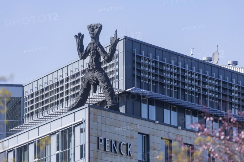 On the acute-angled corner of the building at the junction of Maxstrasse and Ostra-Allee stands a four-metre bronze sculpture of a stick figure created by A. R. Penck, Dresden, Saxony, Germany, Europe