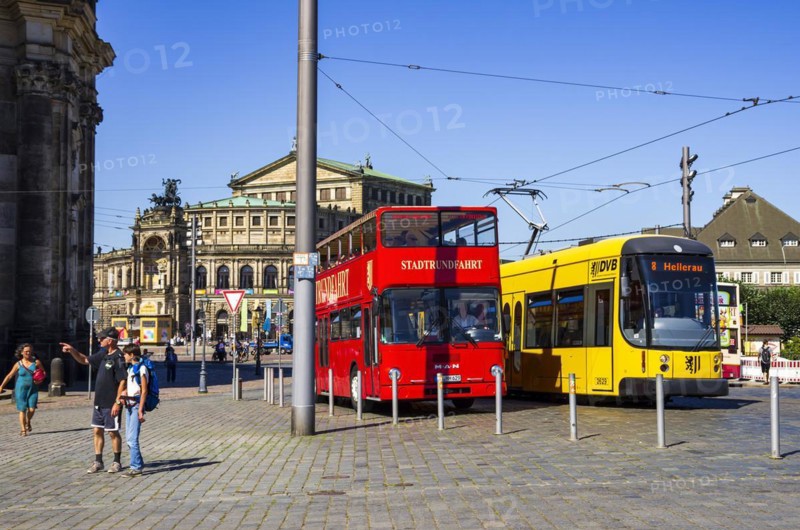 Tourist and traffic situation, double-decker bus for city tours and tram line 8 on the Schlossplatz in Dresden, Saxony, Germany, for editorial use only, Europe