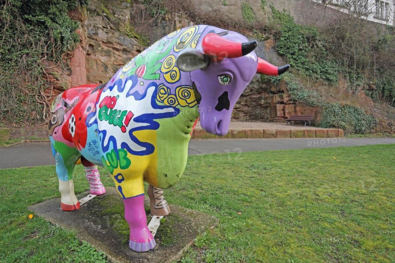 Colourful bull figure, sculpture, inscription, kitsch, rock staircase, bird staircase, Pirmasens, Palatinate Forest, Rhineland-Palatinate, Germany, Europe