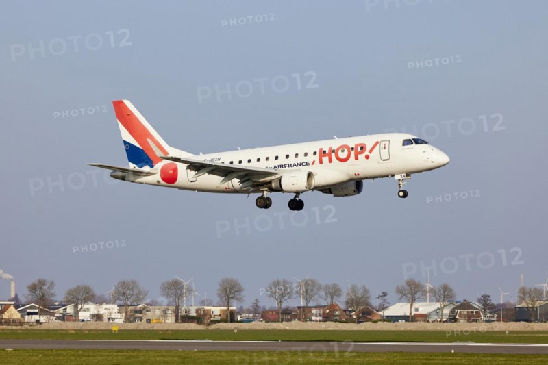Air France Hop Embraer E170LR with the registration F-HBXN approaching the Polderbaan, Amsterdam Schiphol Airport in Vijfhuizen, municipality of Haarlemmermeer, Noord-Holland, Netherlands