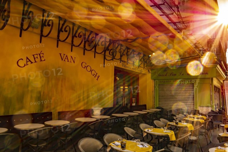 The Cafe Van Gogh in Arles with Sunbeam and Lens Flare in Provence Alpes Cote d'azur in France