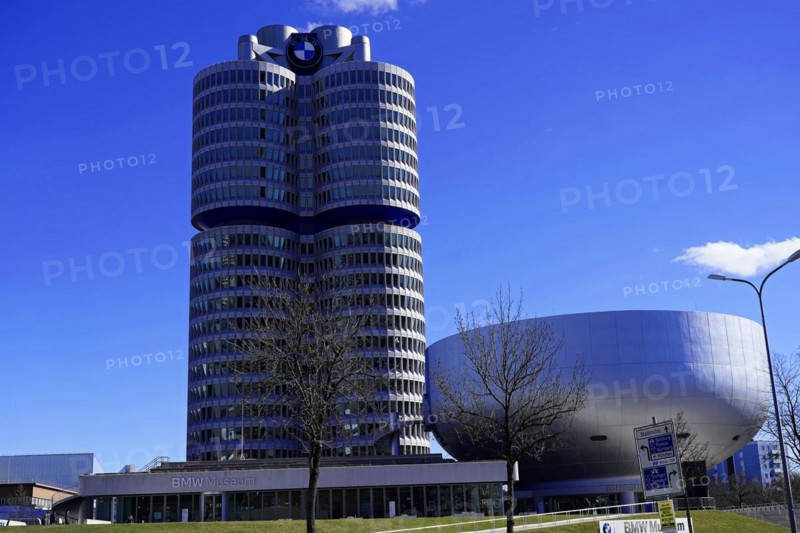 BMW Welt next to the cylindrical BMW Museum building on a sunny day, BMW WELT, Munich, Germany, Europe