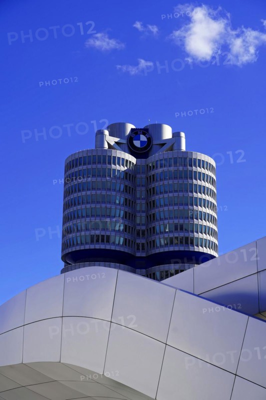 Partial view of the BMW headquarters with company logo against a clear sky, BMW WELT, Munich, Germany, Europe