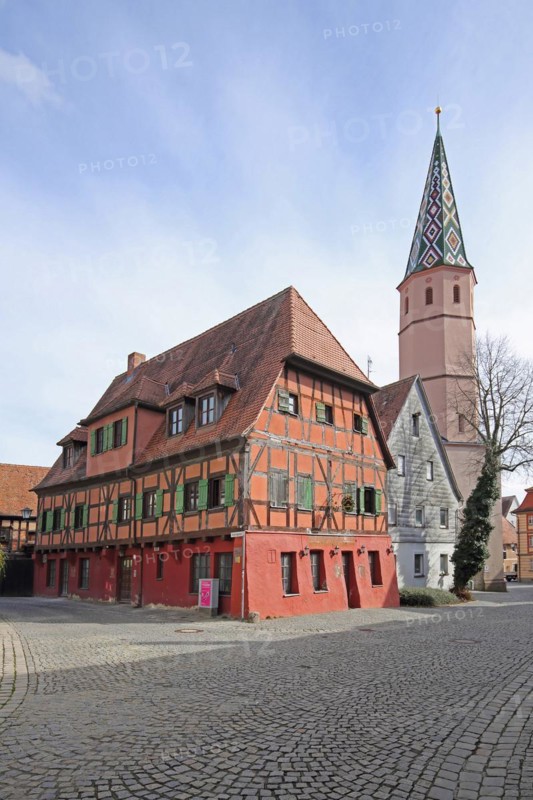 Red house and church tower of St Maria am See church, Seegasse, Bad Windsheim, Middle Franconia, Franconia, Bavaria, Germany, Europe