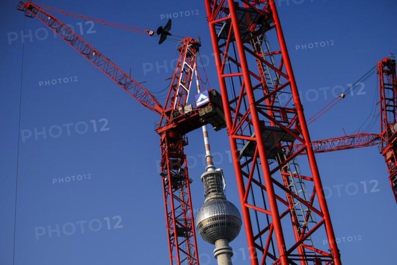 Symbolic photo on the topic 'Aeo Building in Berlin 'Aeo. Construction cranes stand on a building site on Alexanderplatz in front of the television tower. Berlin, 05.03.2024