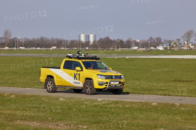 Bird Control Vehicle K1 patrolling the Polderbaan, Amsterdam Schiphol Airport in Vijfhuizen, municipality of Haarlemmermeer, Noord-Holland, Netherlands