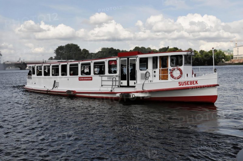 A small excursion boat sailing on the Alster, Hamburg, Hanseatic City of Hamburg, Germany, Europe