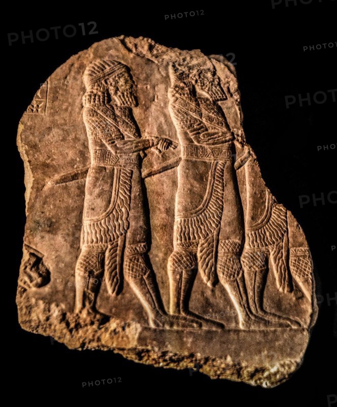 The army, a powerful tool for building the Assyrian empire, three officers of the royal guard on parade, 638-631 BC, Archaeological Museum, Castello di Udine, Udine, most important historical city of Friuli, Italy, Udine, Friuli, Italy, Europe