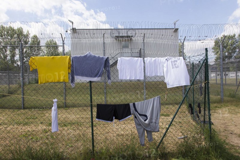 Laundry hanging to dry on a washing line in the central contact point for asylum seekers in the state of Brandenburg in Eisenhuettenstadt, 03/06/2015