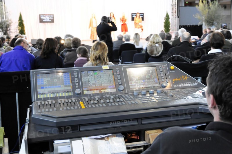 RETRO CLASSICS 2010, Stuttgart Messe, sound engineer working on a digital mixing console during an event, Stuttgart Messe, Stuttgart, Baden-Wuerttemberg, Germany, Europe
