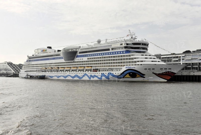 AIDAluna, cruise ship, year of construction 2009, 251, 89m long, The cruise ship AIDAblu lies in the harbour, surrounded by water and a cloudy sky, Hamburg, Hanseatic City of Hamburg, Germany, Europe