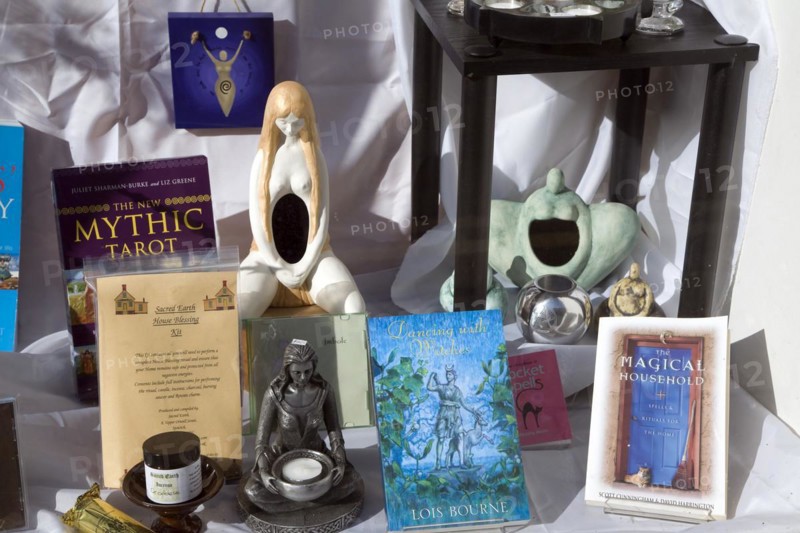 Products on display in shop window of new age mystical shop, Ipswich, Suffolk, England, an example of a specialist shop