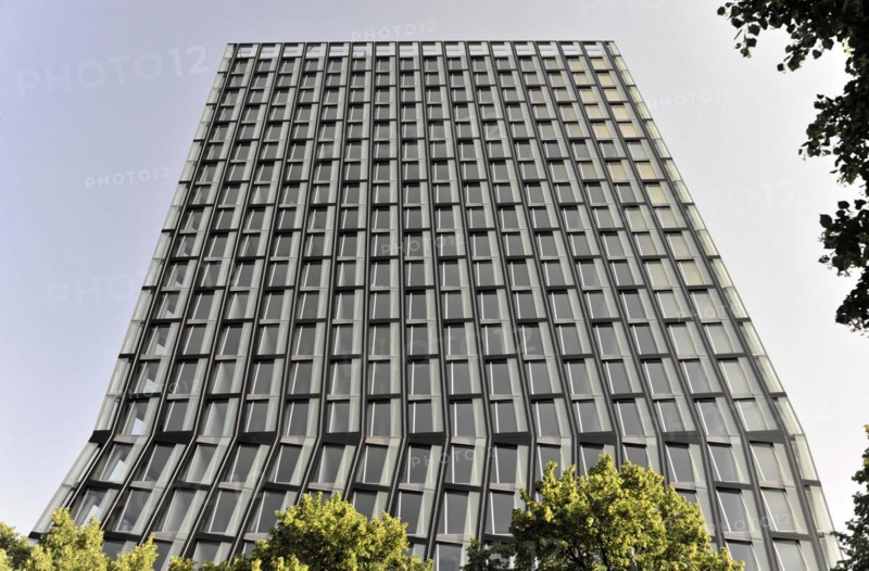TANZENDE TUeRME, hotel and office building, completed in 2012, modern high-rise building with glass facade surrounded by green trees, Hamburg, Hanseatic City of Hamburg, Germany, Europe