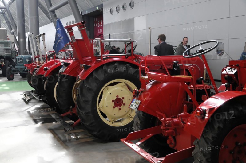 RETRO CLASSICS 2010, Stuttgart Messe, series of old red tractors presented as an exhibited collection, Stuttgart Messe, Stuttgart, Baden-Wuerttemberg, Germany, Europe