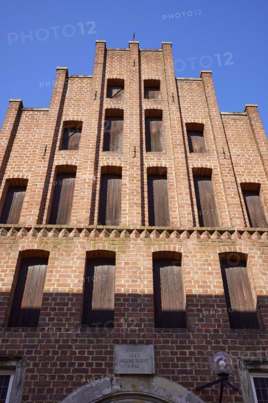 Brick facade of the Hansehaus in the old town centre of Minden, Muehlenkreis Minden-Luebbecke, North Rhine-Westphalia, Germany, Europe