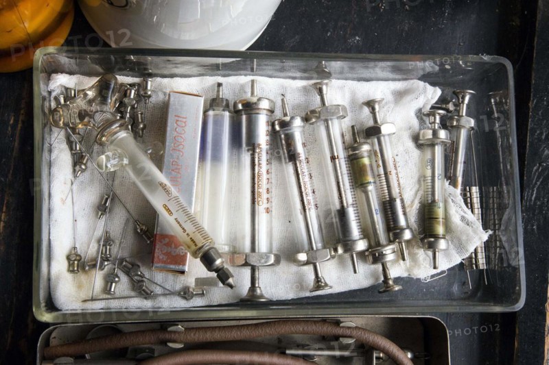 Old syringes in a bowl stand in the former laboratory of the historic Berg-Apotheke pharmacy in Clausthal-Zellerfeld, which was built in 1674 and is one of the oldest pharmacies in Germany, 09 November 2015