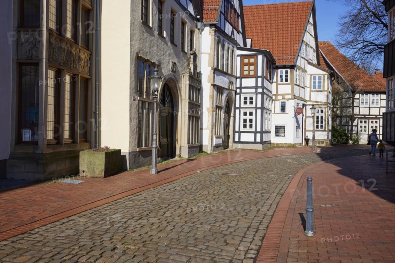 Historic facades and half-timbered houses, lantern and cobblestone street in the Schnurrviertel in the old town centre of Minden, Muehlenkreis Minden-Luebbecke, North Rhine-Westphalia, Germany, Europe