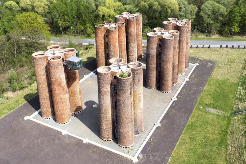An aerial photo shows 24 brick towers rising 22 metres into the sky above Lauchhammer. They are the only remaining part of a coking plant, the Lauchhammer Biotowers. Their polluted wastewater was treated in the towers using a biological process, 06/05/2015