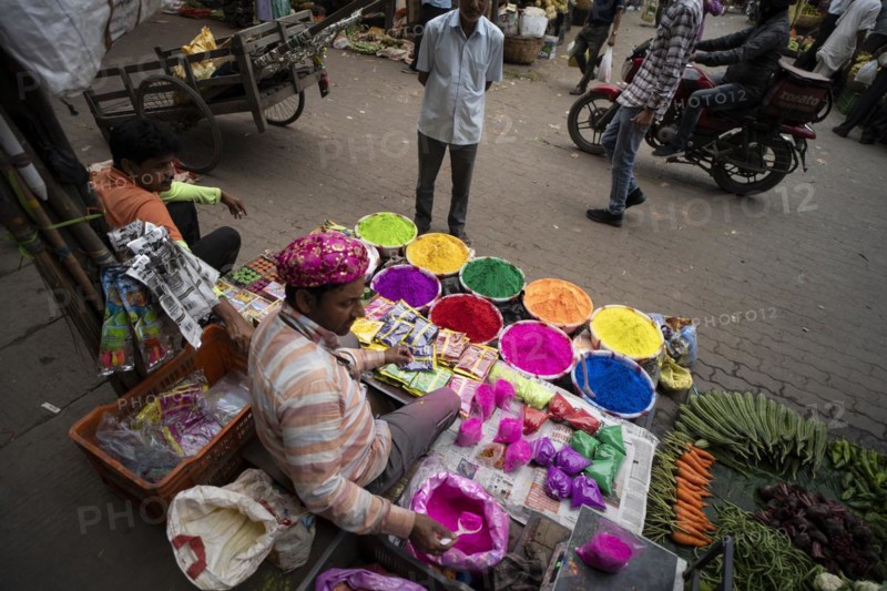 Vendor sells Holi celebration items in a street market, ahead of Holi festival on March 23, 2024 in Guwahati, Assam, India. Holi is the Hindu festival of colours, it is celebrated with great joy in India