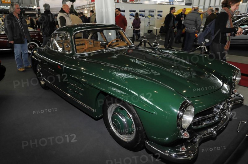 RETRO CLASSICS 2010, Stuttgart Messe, Side view of a green Jaguar E-Type classic car at a trade fair, Stuttgart Messe, Stuttgart, Baden-Wuerttemberg, Germany, Europe