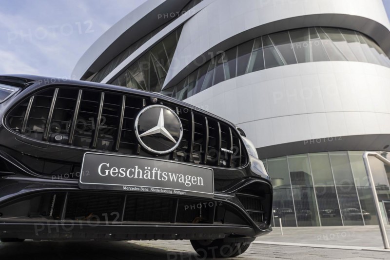 Mercedes company car, radiator grille and Mercedes star on a modern vehicle, in the background the Mercedes-Benz Museum, Baden-Wuerttemberg, Germany, Europe