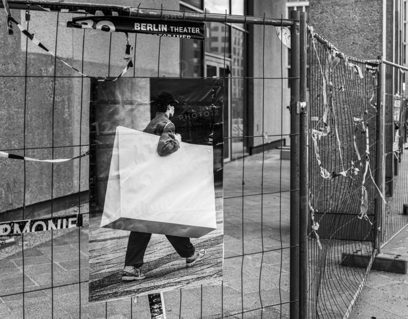 Black and white photograph, symbolic photo, poster on a construction fence, Berlin, Germany, Europe