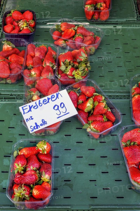 A fruit stand in mid-March with overripe strawberries, bowl for EUR 0, 99, Allgaeu, Bavaria, Germany, Europe