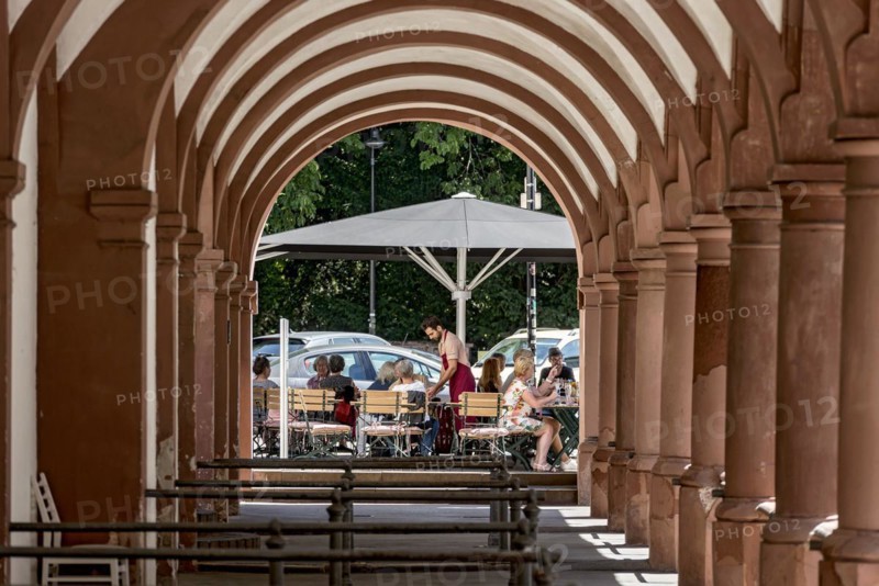 Restaurant and street cafe with waiter and guests, historic market arbours, archway with columns, arcades, Giessen weekly market market, old town, Giessen, Giessen, Hesse, Germany, Europe