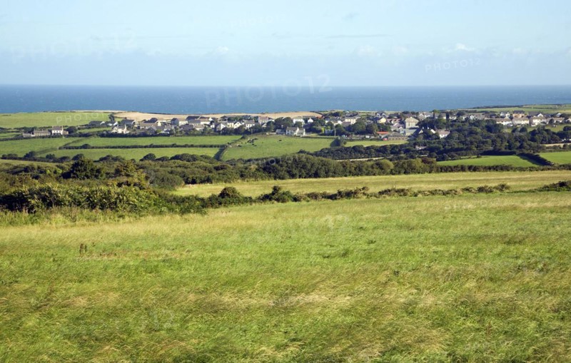 Linear coastal village of Trefin, viewed over fields, Pembrokeshire, Wales, United Kingdom, Europe