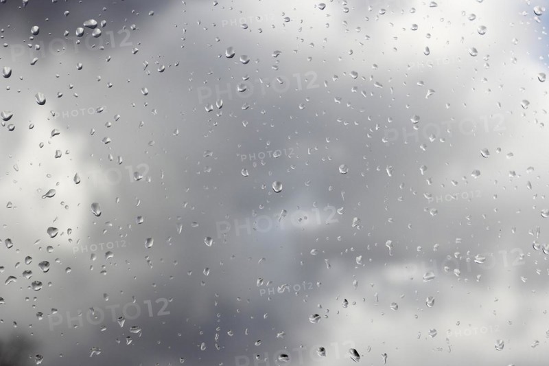 Raindrops on a window pane, North Rhine-Westphalia, Germany, Europe