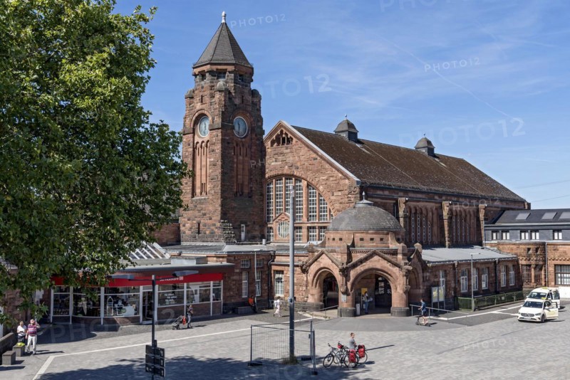 Historic Wilhelmine railway station, clock tower, pavilion with entrance to the station building, neo-Romanesque and Art Nouveau, red sandstone, cultural monument, listed building, Giessen, Giessen, Hesse, Germany, Europe