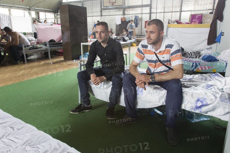 Refugees are housed in a gymnasium at the central contact point for asylum seekers in the state of Brandenburg, 03/06/2015