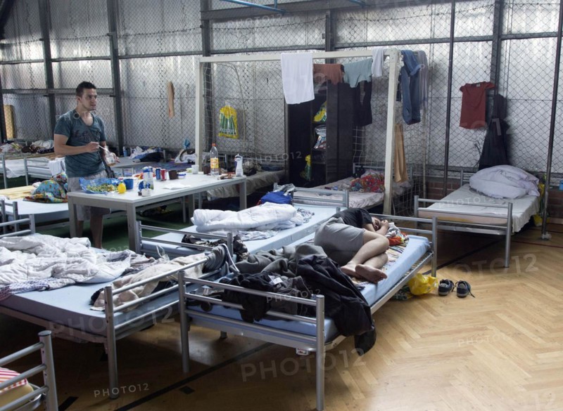 Refugees from Syria are housed in a gymnasium at the central contact point for asylum seekers in Brandenburg, 03/06/2015