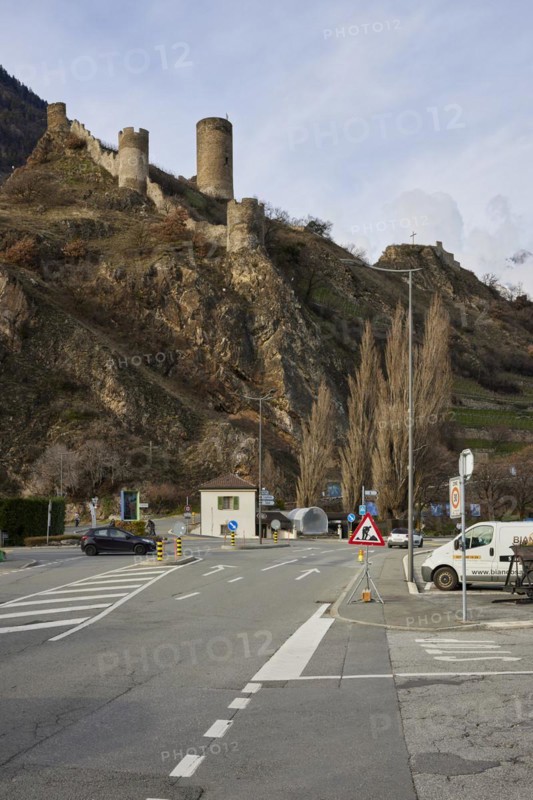 Saillon Castle with the Bayart tower and road in Saillon, district of Martigny, canton of Valais, Switzerland, Europe