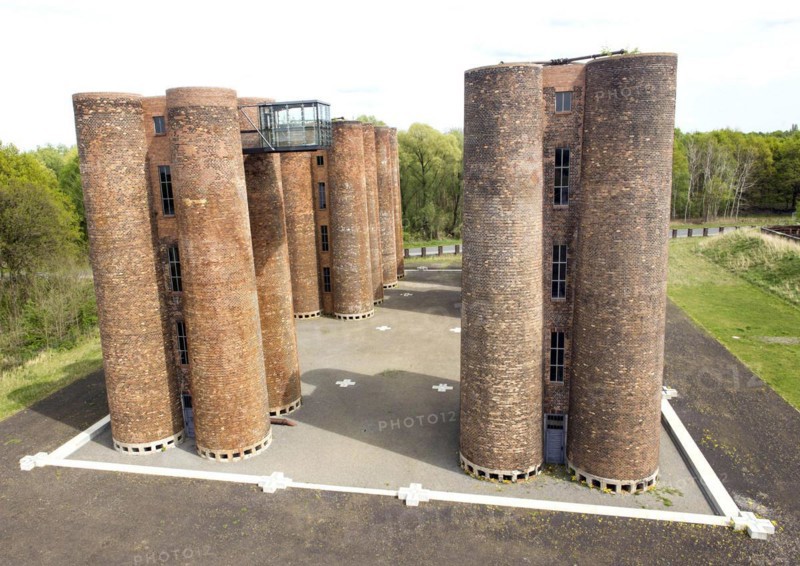 An aerial photo shows 24 brick towers rising 22 metres into the sky above Lauchhammer. They are the only remaining part of a coking plant, the Lauchhammer Biotowers. Their polluted wastewater was treated in the towers using a biological process, 06/05/2015