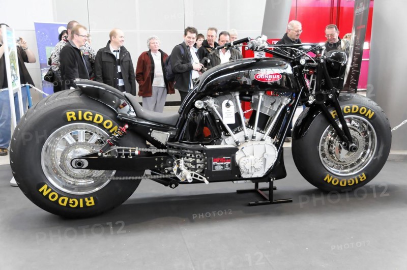 RETRO CLASSICS 2010, Stuttgart Trade Fair, Black exhibition motorbike with eye-catching RIGDON tyres, surrounded by trade fair visitors, Stuttgart Trade Fair, Stuttgart, Baden-Wuerttemberg, Germany, Europe