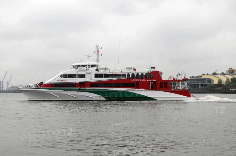 Red and white catamaran on calm waters named 'Halunder Jet', Hamburg, Hanseatic City of Hamburg, Germany, Europe