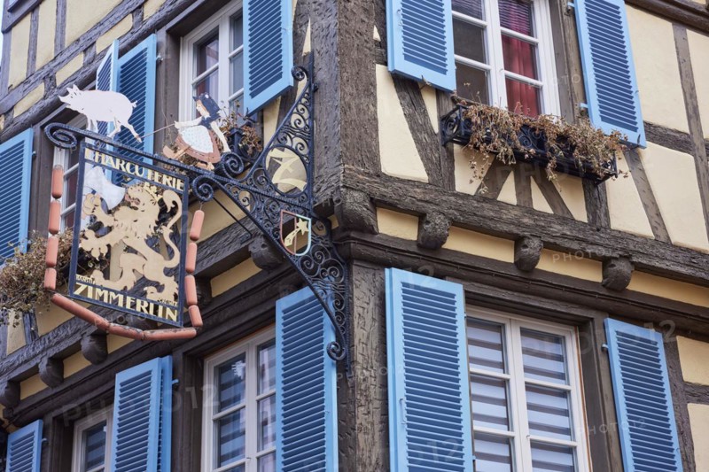 Charcuterie sign on a historic half-timbered house in the old town centre of Colmar, Department Haut-Rhin, Grand Est, France, Europe