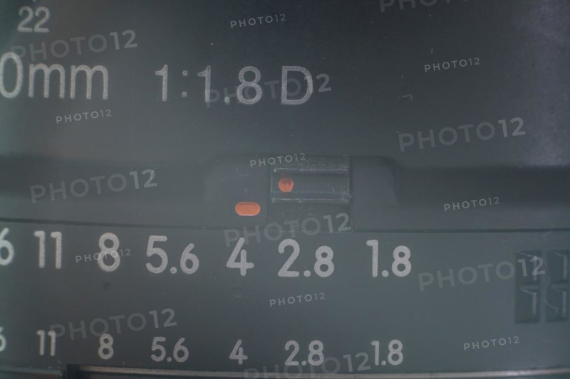 Close up detailed shot of a prime lens 50mm f1.8g in soft natural light