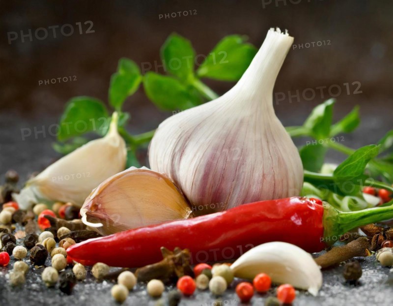 Fresh garlic arranged with red chilli, colourful peppercorns and green herbs, AI generated, AI generated