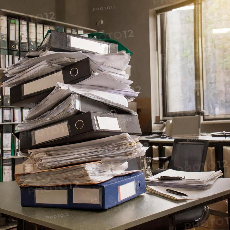 High stacks of files and piles of paper organised on office filing areas, symbolism bureaucracy, AI generated, AI generated