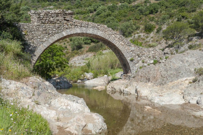 Historic arch bridge Le Pont des Fees over the river La Garde, Grimaud-Village, Var, Provence-Alpes-Cote d'Azur, France, Europe