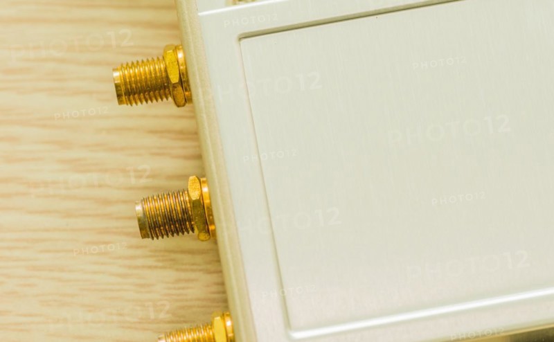 Gold-plated antenna ports on beige technology hardware, in South Korea