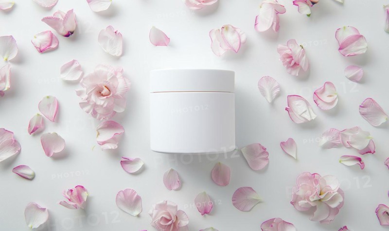 Creme jar blank mockup surrounded by delicate flower petals AI generated