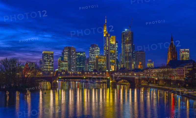 The Frankfurt skyline with office tower blocks behind the Main at blue hour after sunset, on the right the Kaiserdom, Frankfurt am Main, Hesse, Germany, Europe