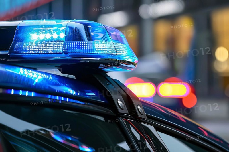 Close up of blue police car light. KI generiert, generiert, AI generated