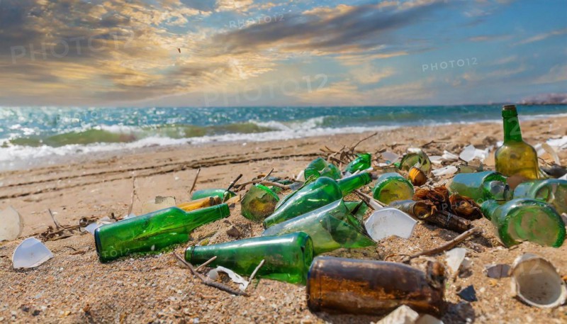 Empty glass bottles lying on the beach, some broken, pollution, AI generated, AI generated